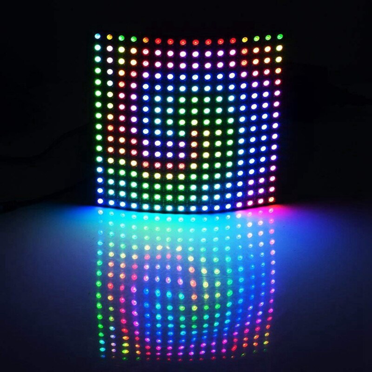 A colourful pixel-art cat glowing on a 16 by 16 RGB LED matrix